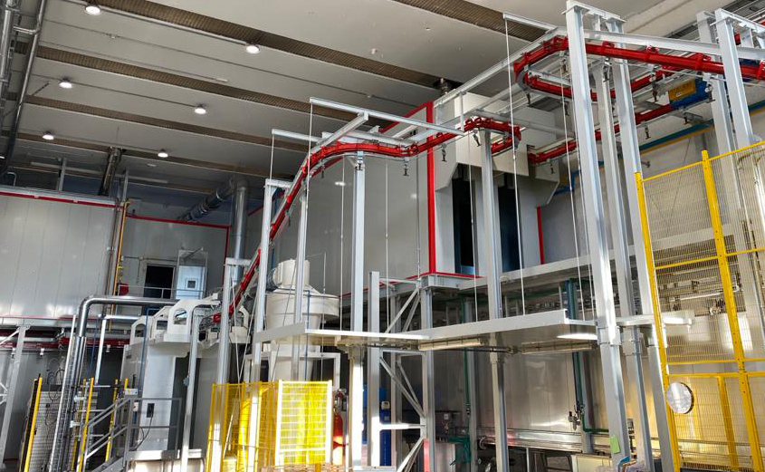 Fully automated high-production rate powder painting plant