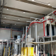 Fully automated high-production rate powder painting plant
