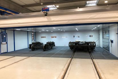 Cabina di lavaggio di assi di treni