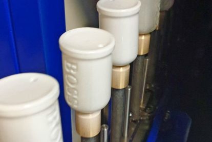 Impianto di verniciatura rotazionale per cosmetica